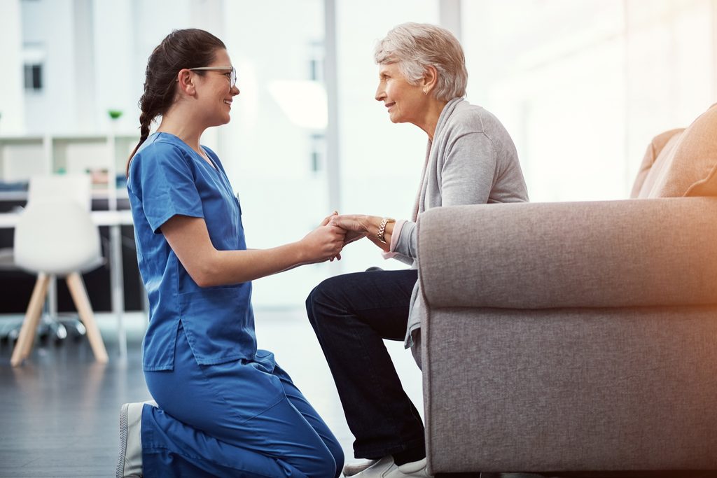 Registered Home Care Aide helping a client at home
